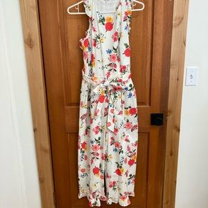 Gal Meets Glam floral romper with ruffle details.